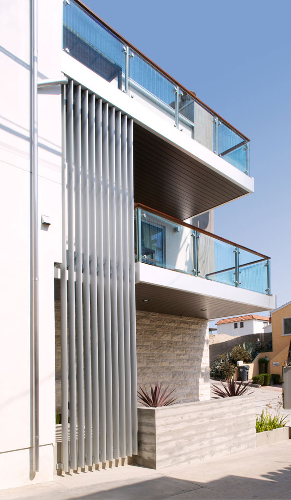 Looking down Crest Drive at the façade and brise-soleil