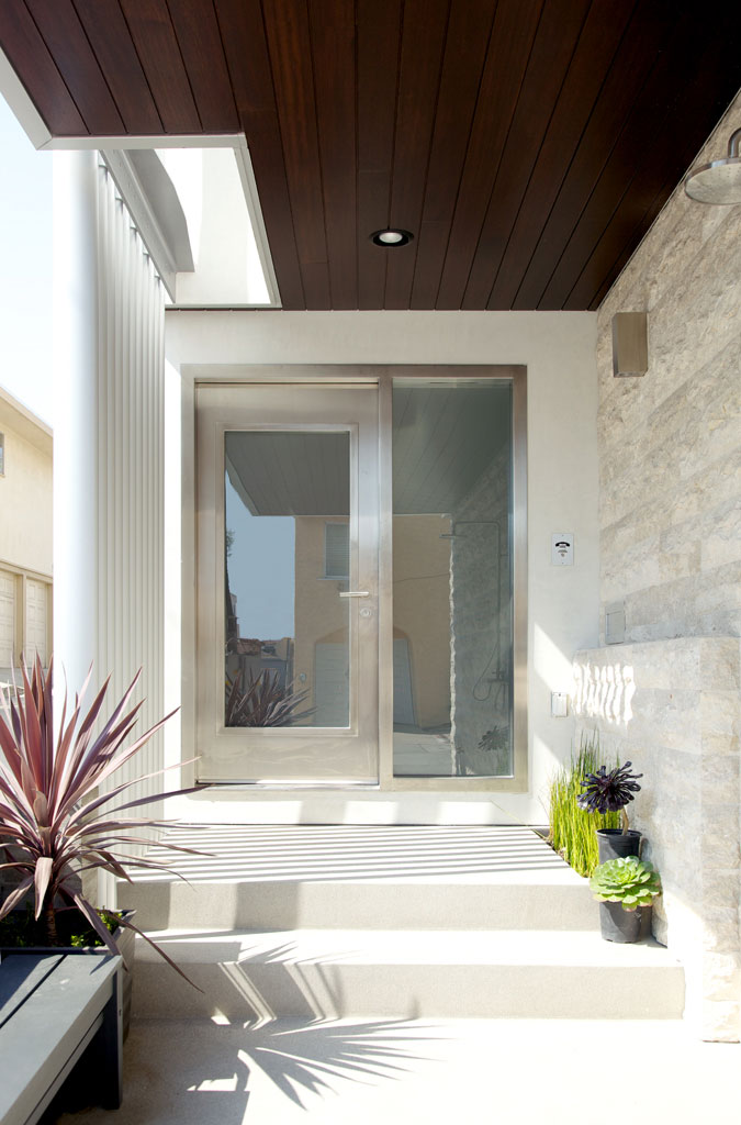 The stainless steel and glass front door.