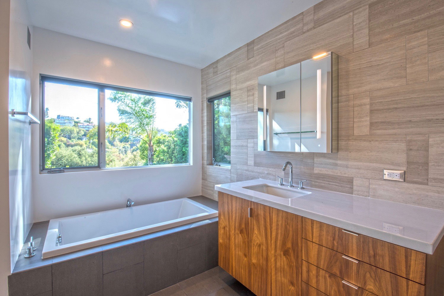 The new master bath and view into the backyard.