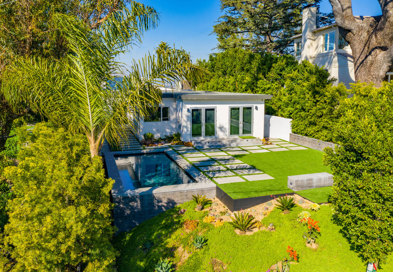 An aerial view of the Laurelwood House, backyard and pool.