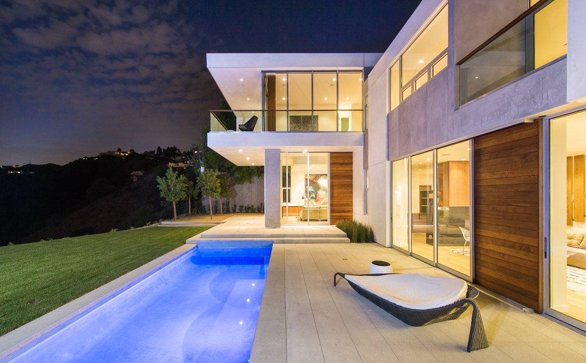 The pool deck and house.