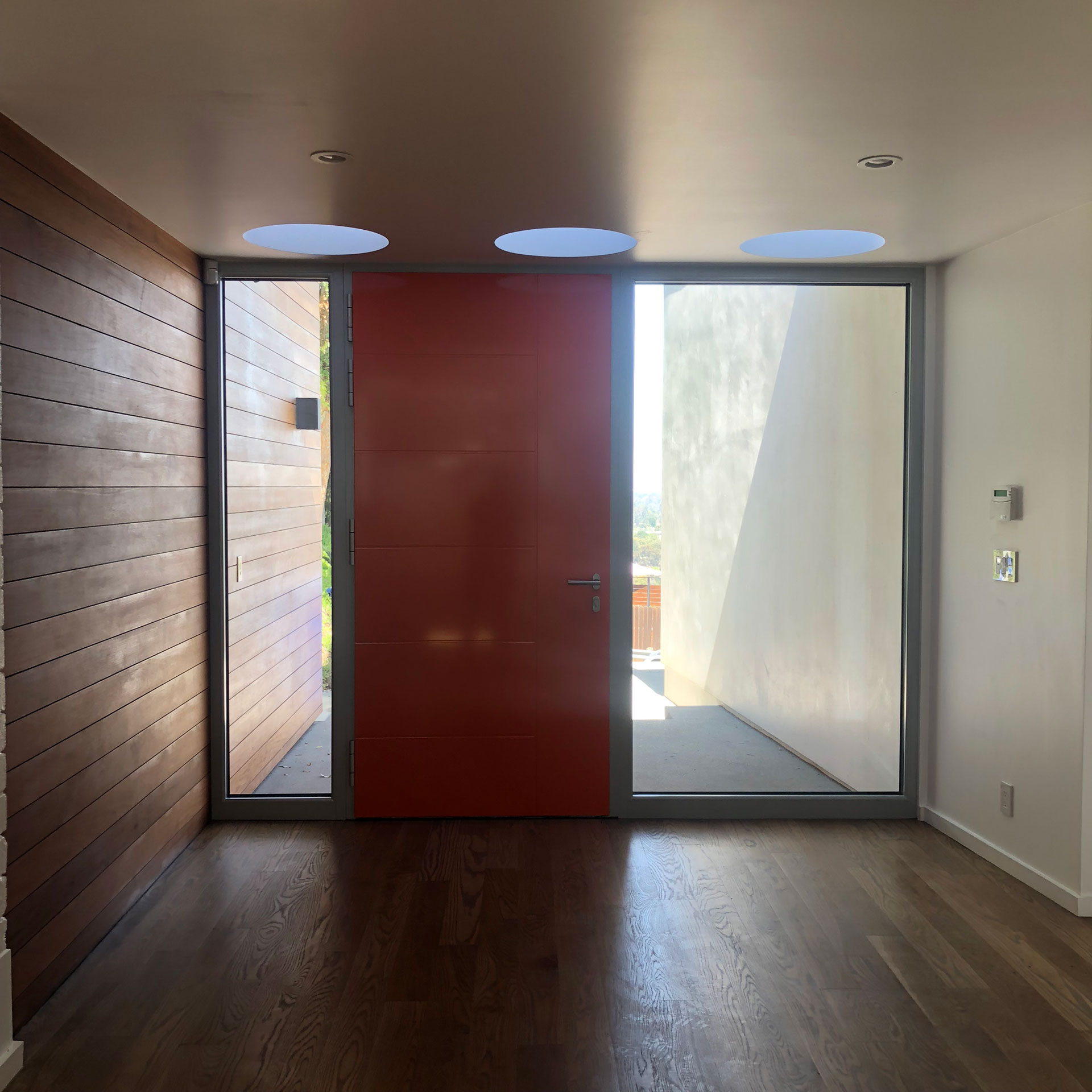 Three skylights and the new interior stair allow light into the new foyer.