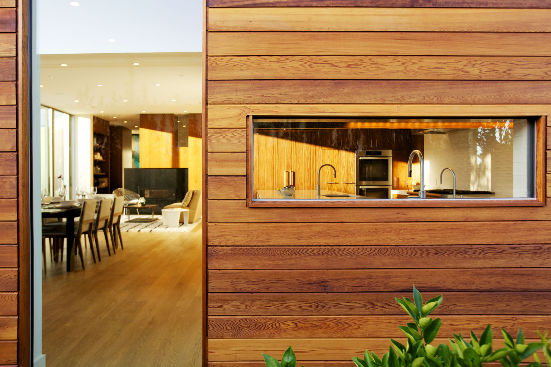 A view into the kitchen form the edible garden.