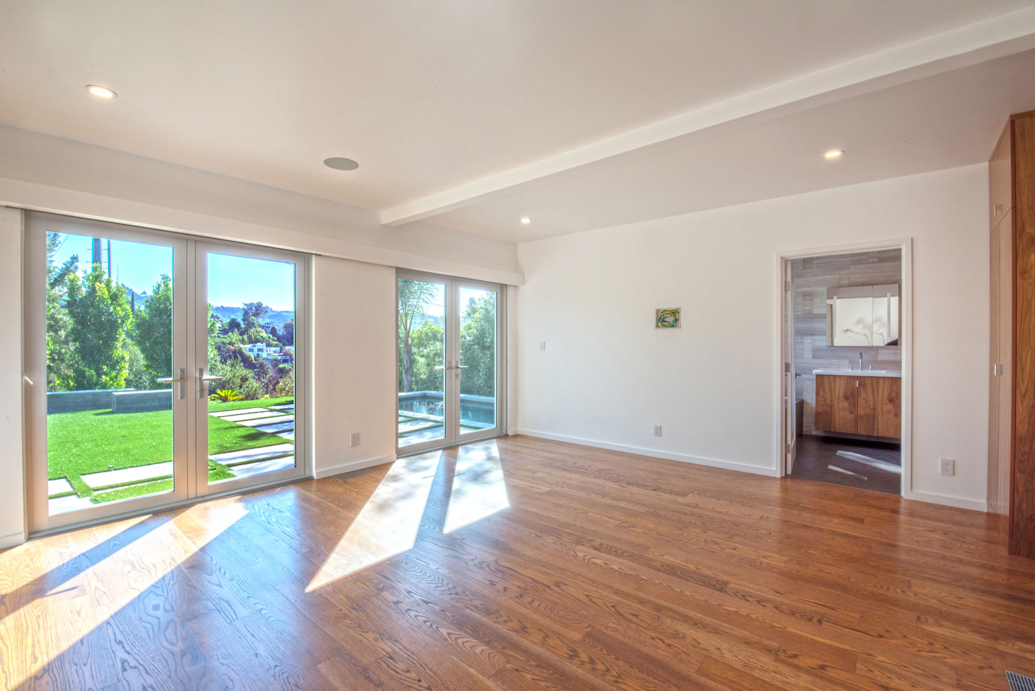 The new master bedroom and view to the backyard.