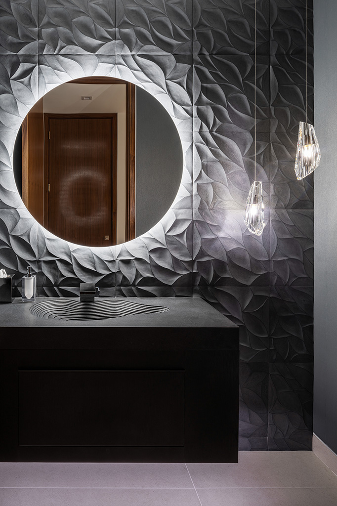 The custom textured tile wall in the Powder Room Photo: ©Paul Vu, Here and Now Agency