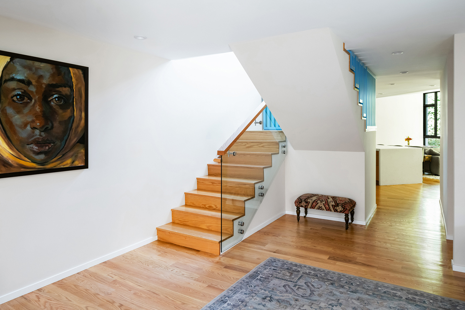 The stair forms the knuckle between the old and new on the ground floor. Photo: ©Paul Vu, Here and Now Agency