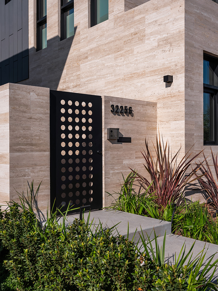 The gate leads to the side garden and eventually the front door. Photo: ©Paul Vu, Here and Now Agency